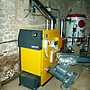 ETA HACK 50KW wood chip boiler installed with 30cubic metre wood chip store for district heating in Devon